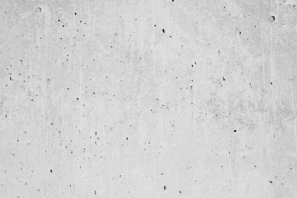 a black and white photo of a concrete wall